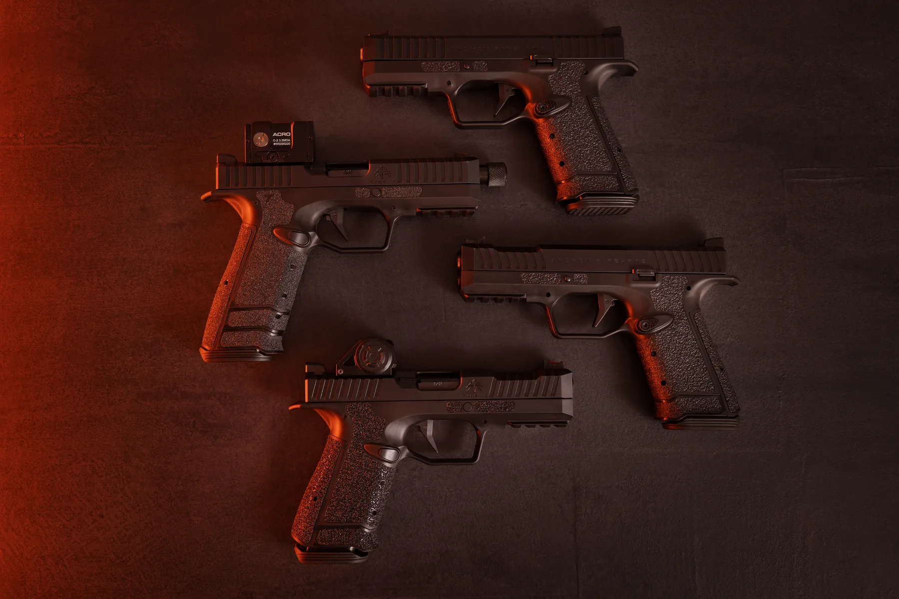 Archon pistol lineup under red studio lighting